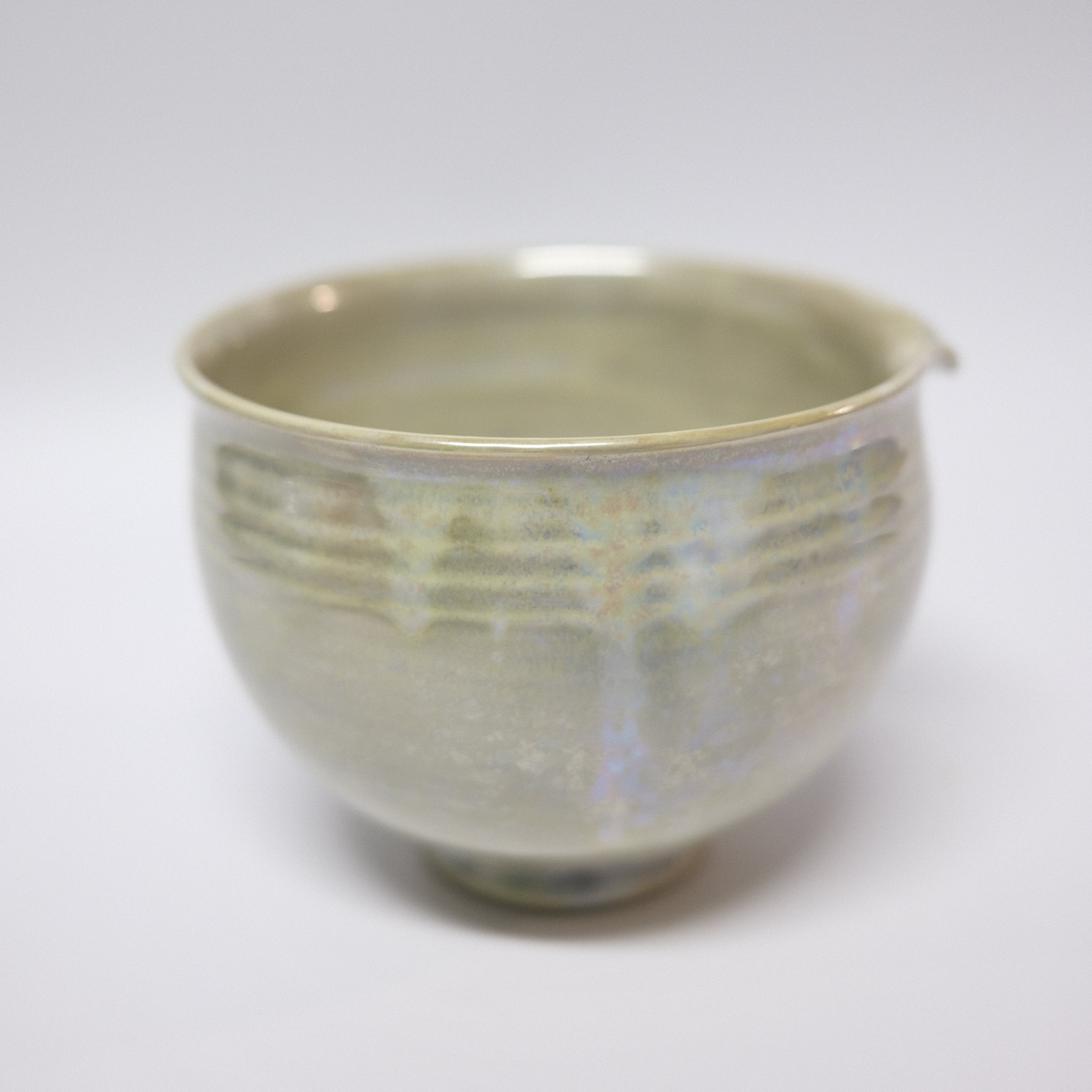 Ceramic bowl with textured surface on a white background