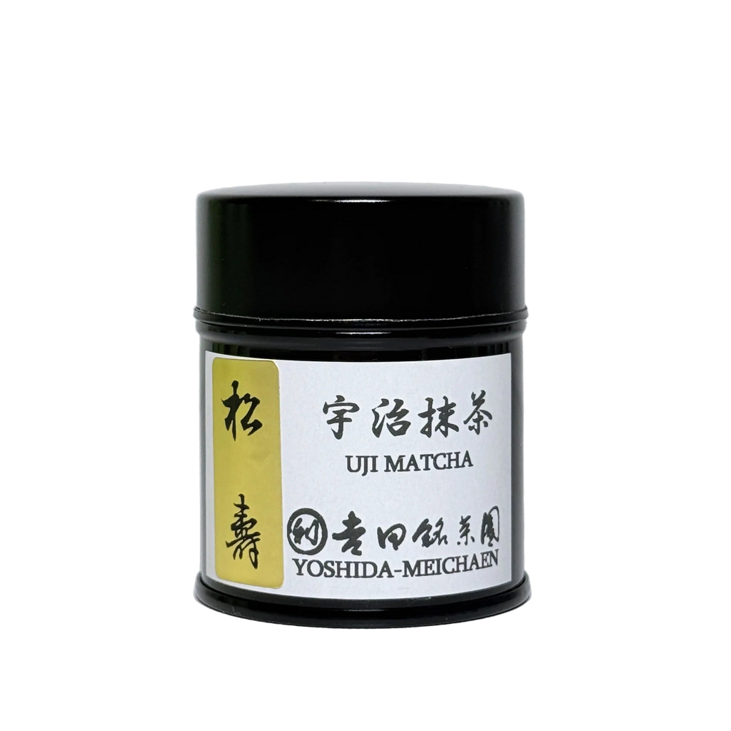 Black container with a white label featuring text and branding on a light gray background